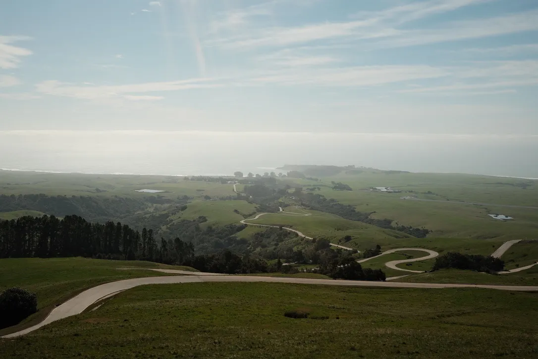 Winding roads through the hills toward the coast